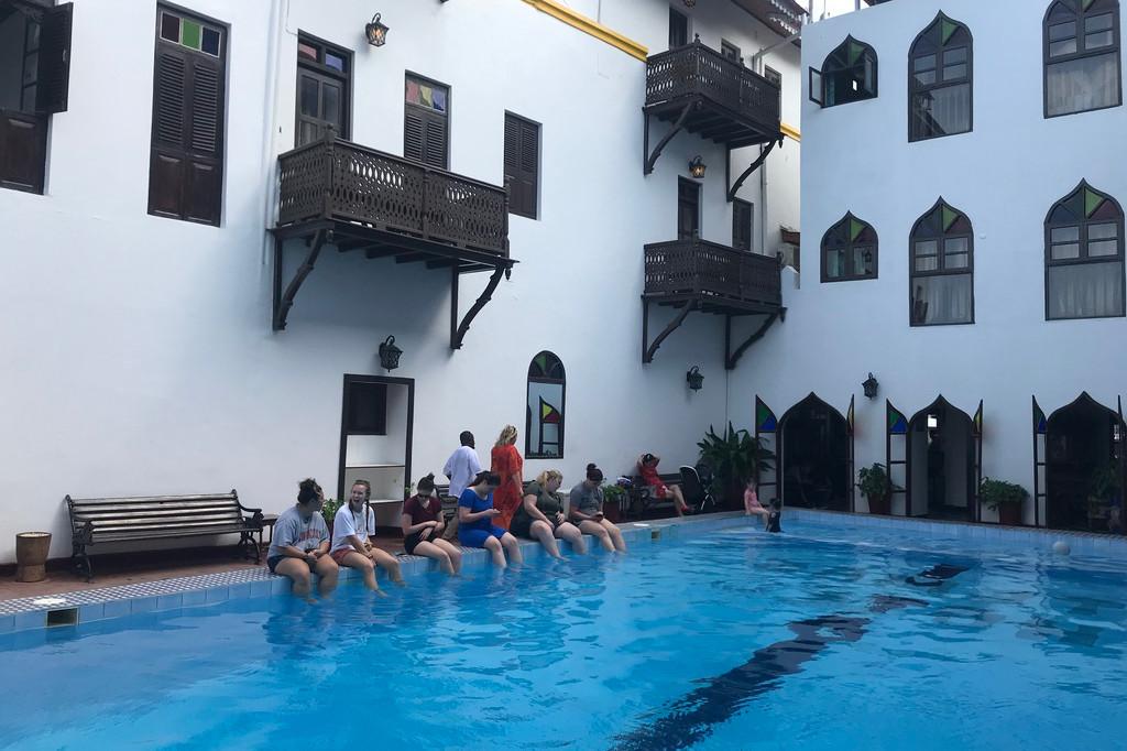 Students take a dip in the pool.